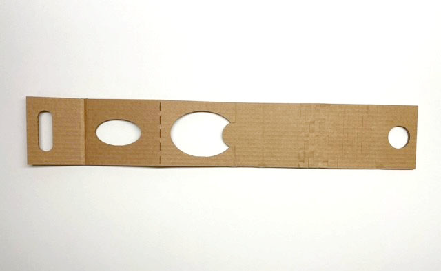 Flat one-bottle HEXPAND insert with score locations