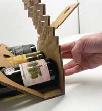 Expanded bottom section folded upward around three bottles